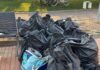 Imperia, volontari peruviani ripuliscono il Parco Urbano. “Non vogliamo si abbia un’immagine sbagliata di noi” rifiuti
